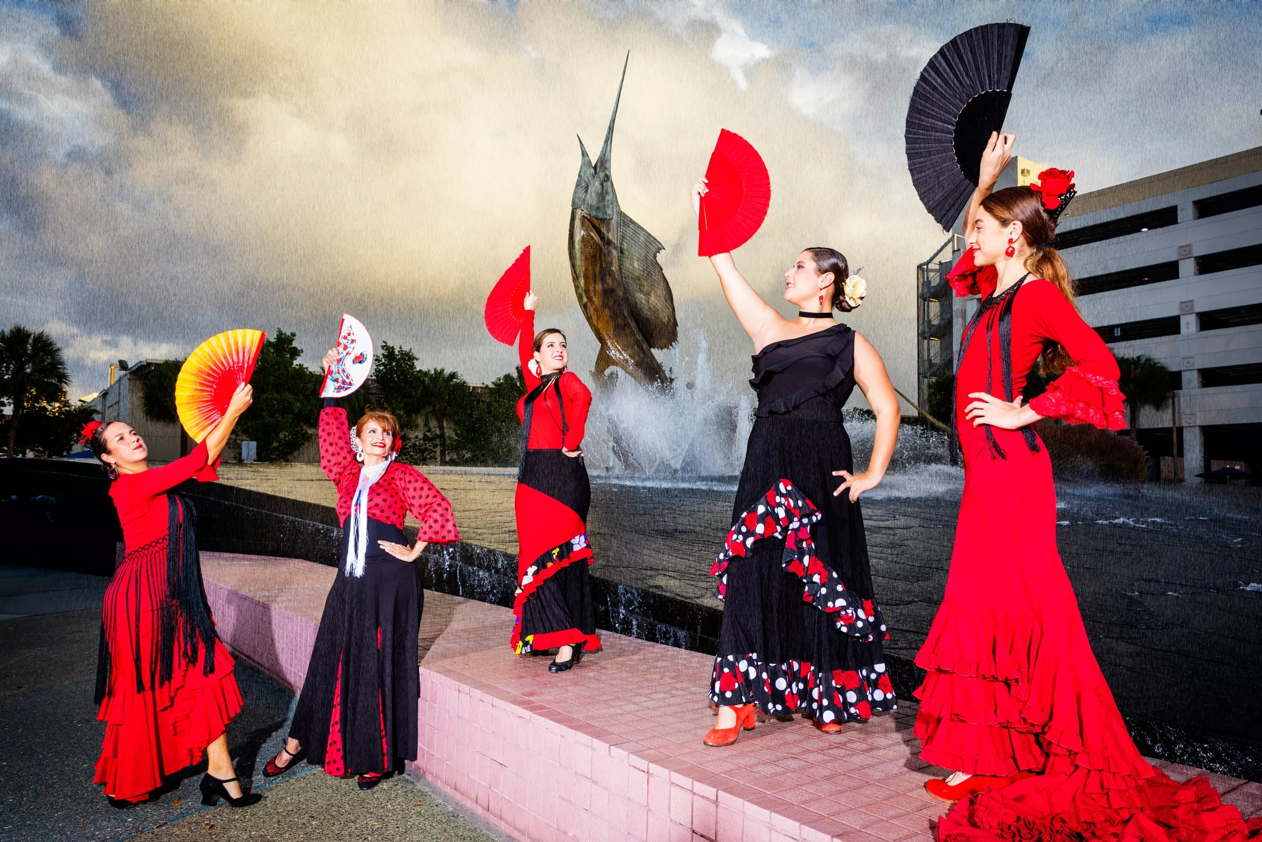 Three women dance.